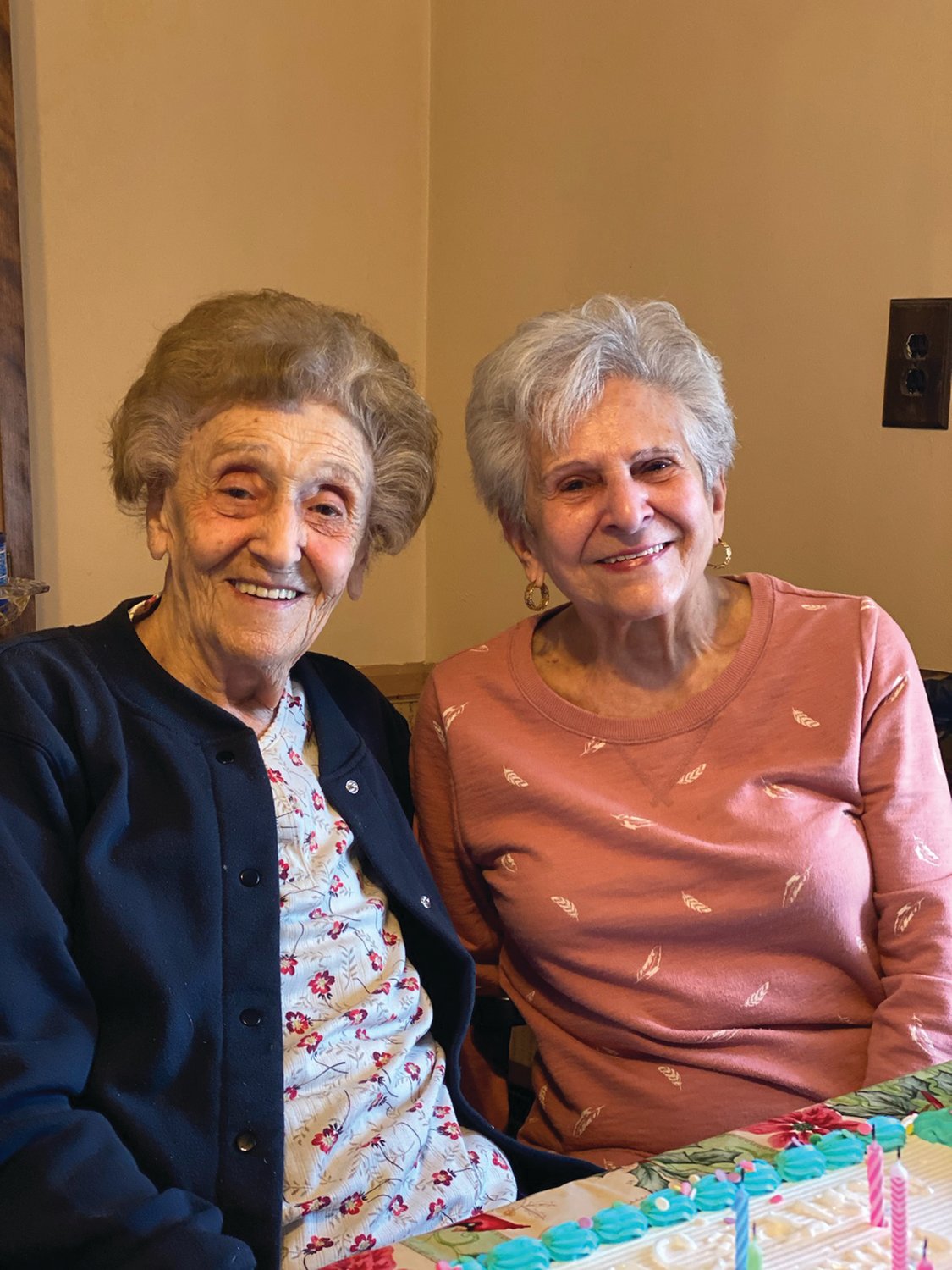 BIG PARTY: On Sunday, about 25 friends and family packed Celentano’s Binghampton Avenue home, where she’s lived her entire life, for a 100th birthday celebration. She posed for a photo with her younger sister Alice Macera, 88.